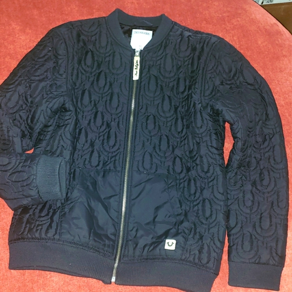 Authentic black quilted jacket.